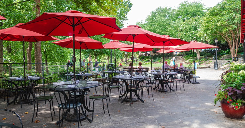 Exterior, patio tables and seats with parasols
