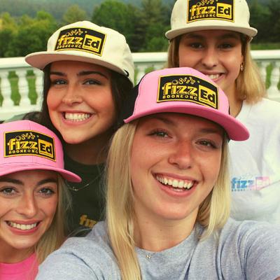 Group selfie with FizzEd caps.