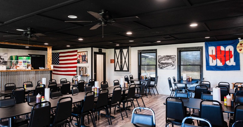 Interior, tables and chairs ready for guests