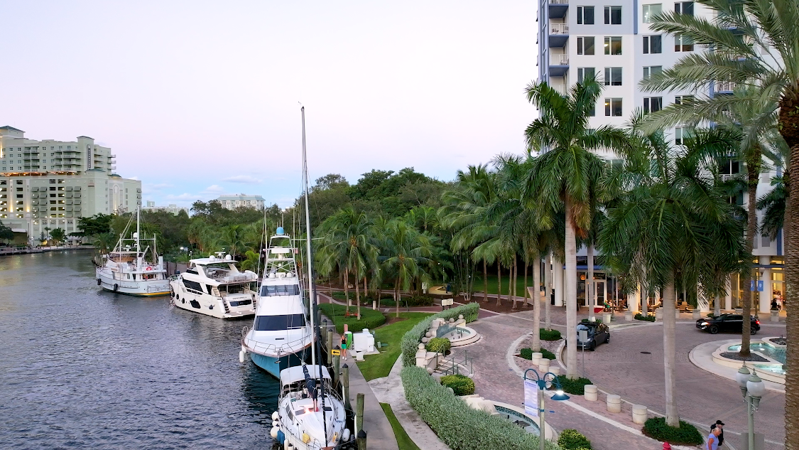 Ships docked by the park coast