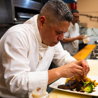 Chef preparing food.
