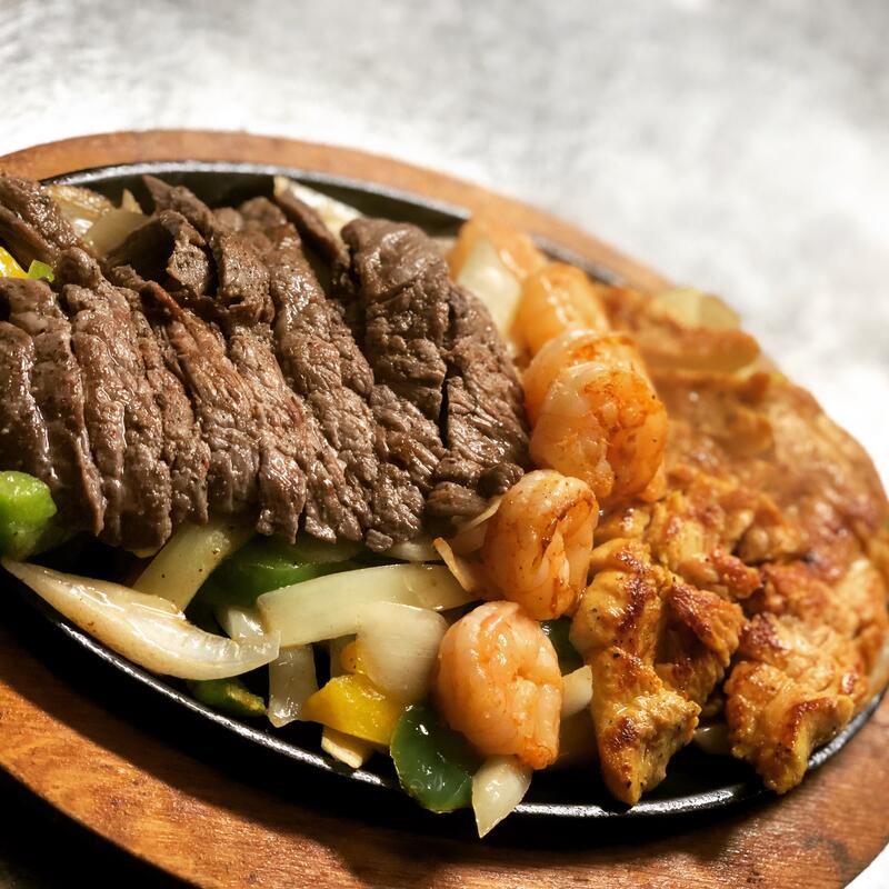 Fajita Trio Shrimp, Chicken, Carne Asada photo