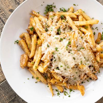 Loaded fries, with melted mozzarella, and brown gravy.
