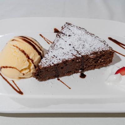 Chocolate almond cake, with vanilla ice cream