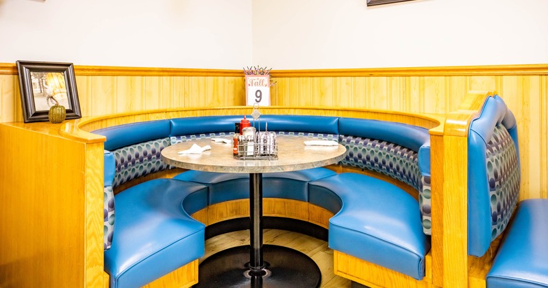 Interior, seating booth and a table