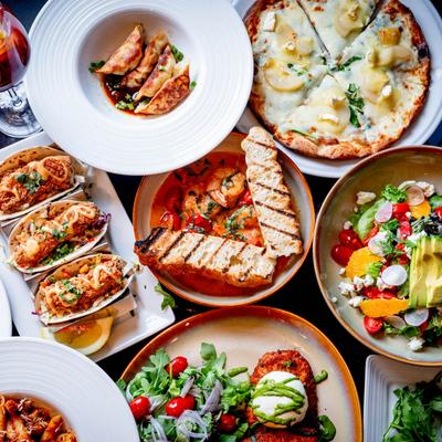 Assorted dishes grouped, top view.