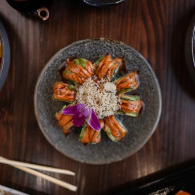 Sushi rolls and tempura flakes.