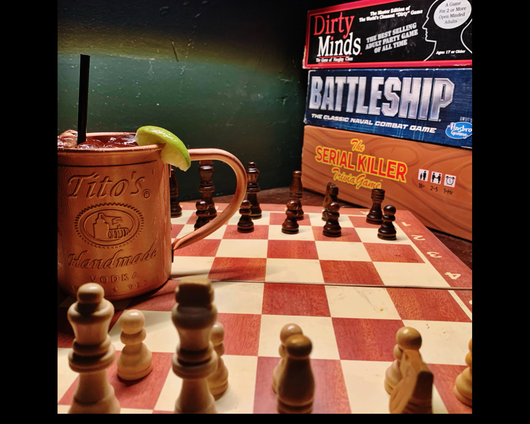 Chess and Moscow Mule cocktail.