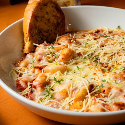 Cavatelli pasta, with Italian sausage, marinara sauce, melted cheese, and garlic toast.