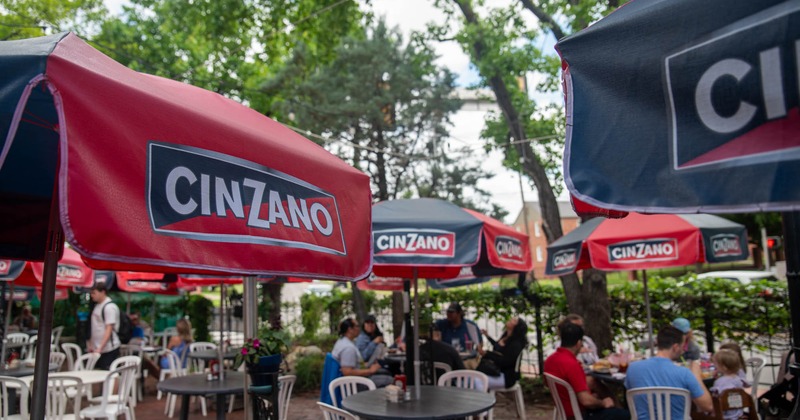 Exterior, patio, tables and chairs, parasols, guests