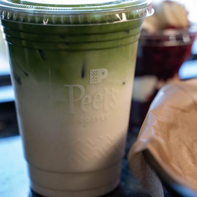 Matcha latte with layered green and white appearance.