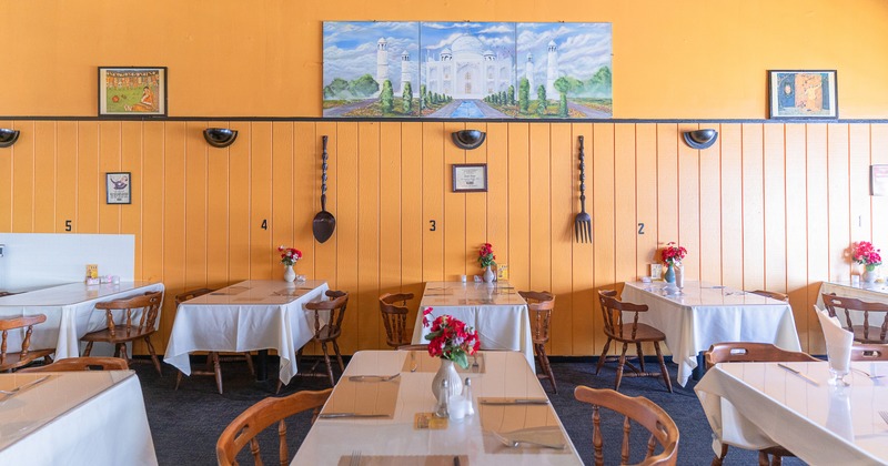 Interior dining area with set tables ready for guests