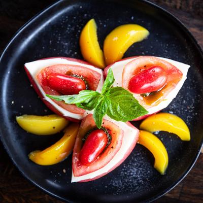 Alex's peach burrata, served, top view.