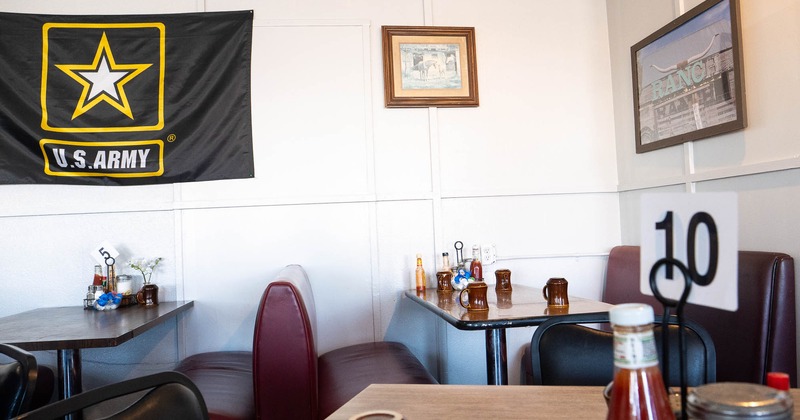 Interior, tables and chairs ready for guests