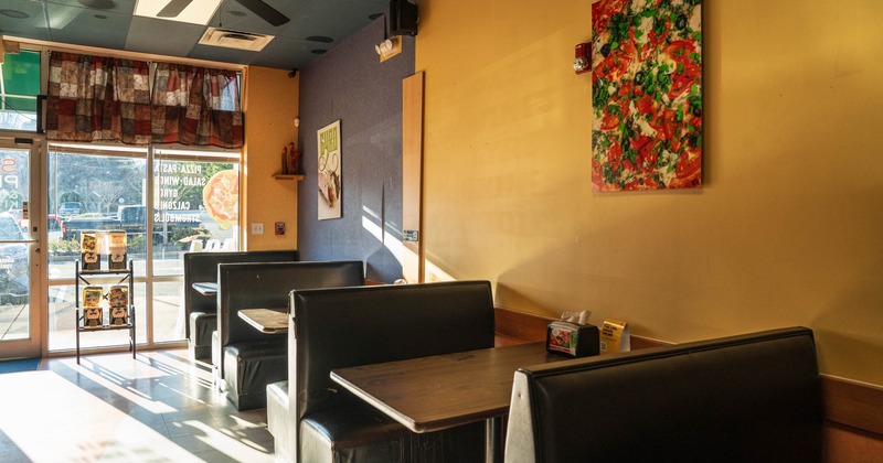 Interior, dining area, restaurant entrance with shop window, seating booths