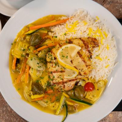 Lemon Chicken, with veggies, olives, and rice.