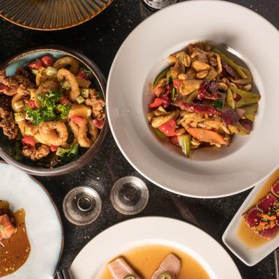 Variety of menu items served on the table, top view.