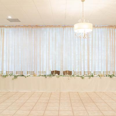 A main table and dancing floor in front