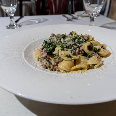 Orecchiette pasta with Italian sausage, broccoli rabe, white wine, and cheese