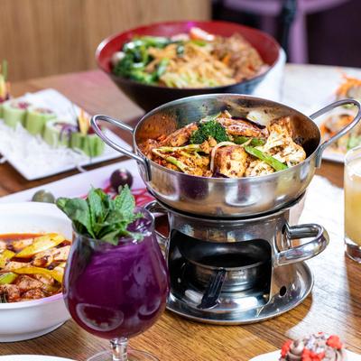 Various meals and drinks on the table.
