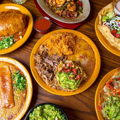 Vibrant Mexican dishes on a table.