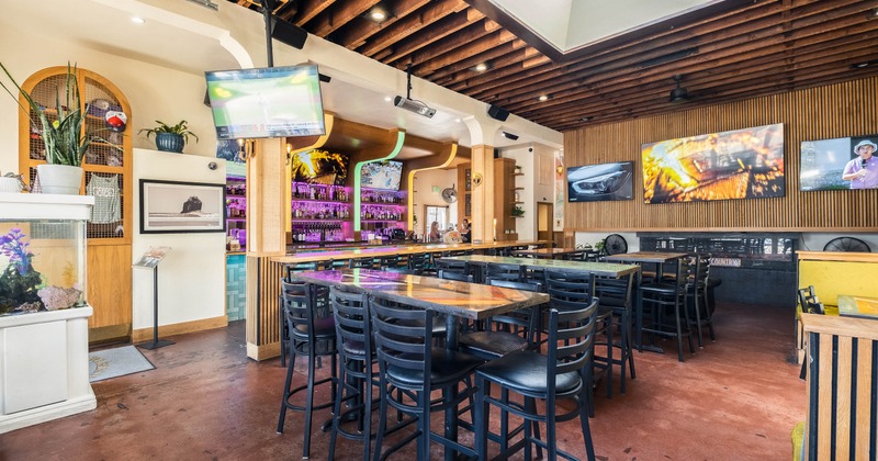 Dining area, TVs on the walls