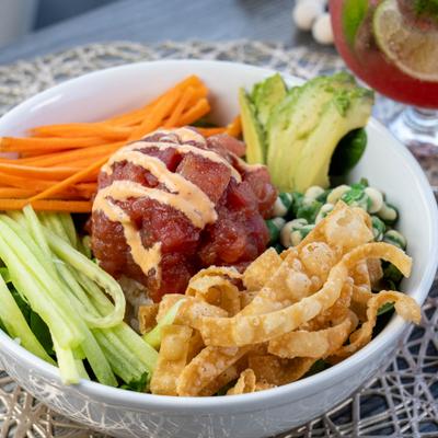Tuna poke bowl, closeup, top view.