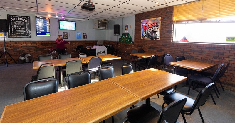 Interior, seating area with long tables