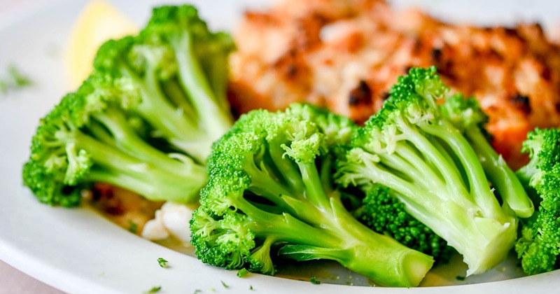 Seafood Stuffed Haddock, served with broccoli