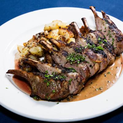 Roasted Rack of Lamb with green peppercorn sauce, and fried potatoes.