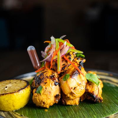 Garlic chipotle and lemon marinated chicken, served