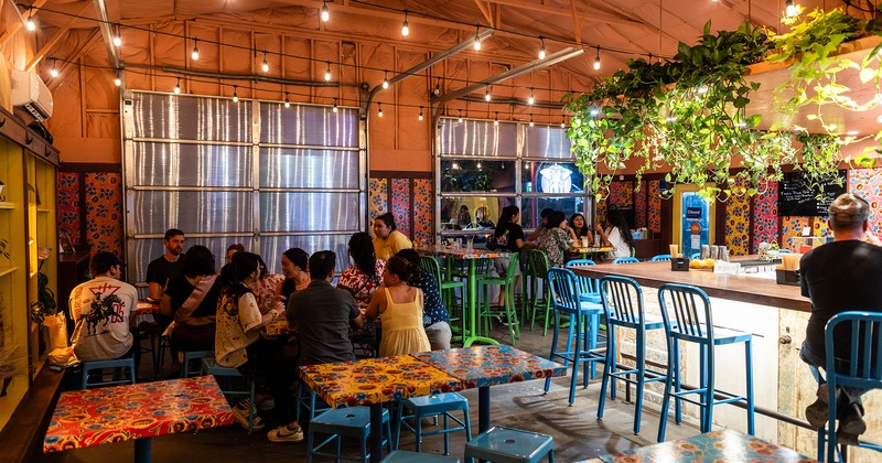 Interior space, bar and seating area with guests