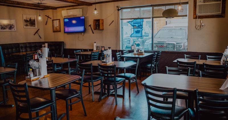 Interior, seating area with tables and chairs