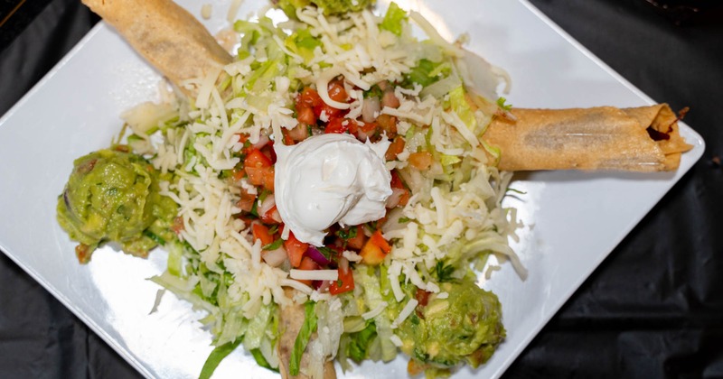 Taquitos with guacamole