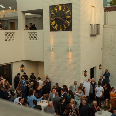 Exterior, wedding party in progress.