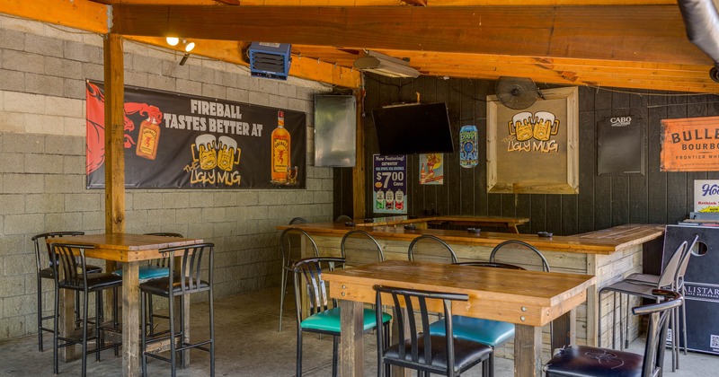 Exterior, patio, tables and chairs, bar on the right