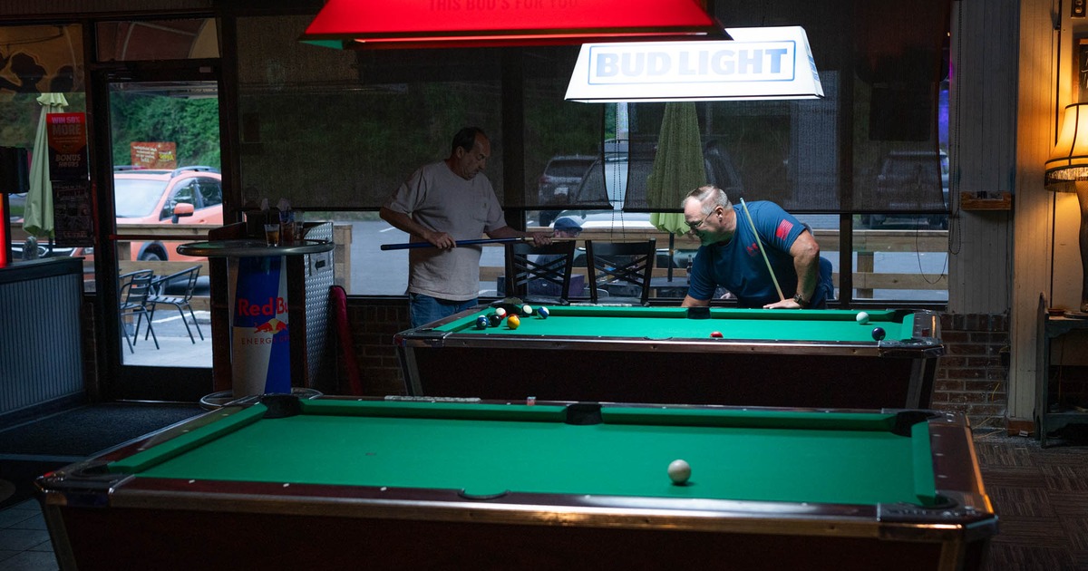 Interior, two guests playing pool