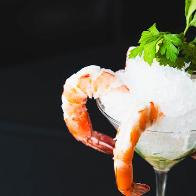 Jumbo shrimp cocktail, close-up.