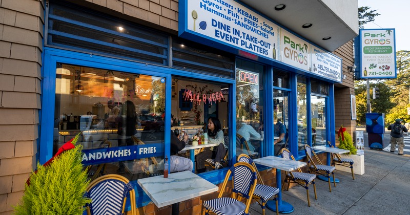 Exteriopr, front view to restaurant, side walk garden,entrance, tables, chairs