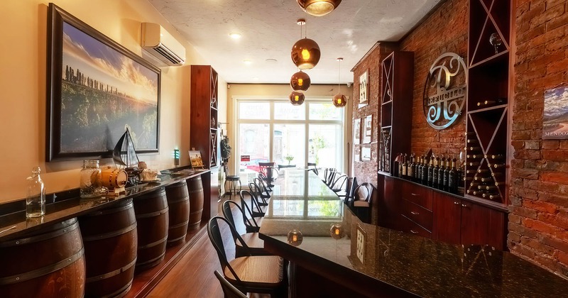 Interior, a bar with bar stools and entrance in the back