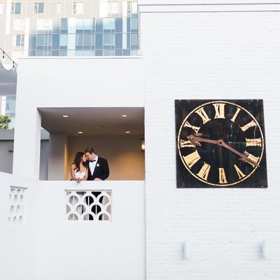 The bride and groom on the balcony.
