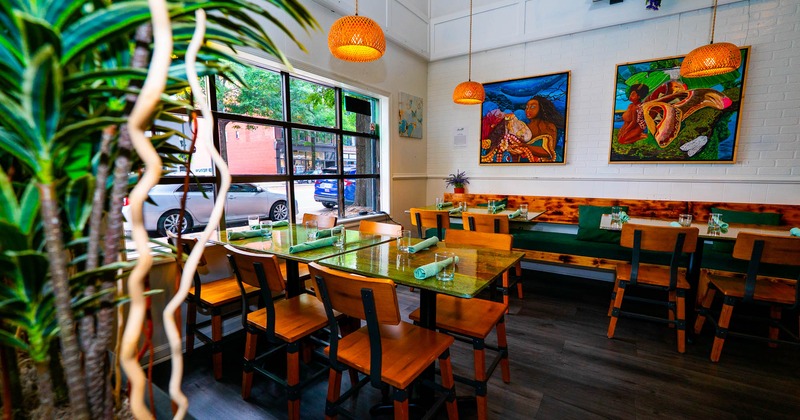 Interior, dining area, tables with chairs, banquette bench with tables, shop window