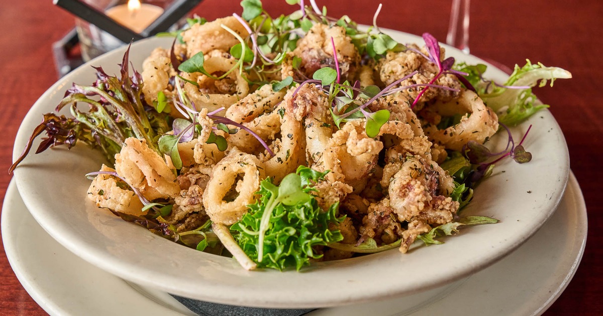 Calamari served with greens