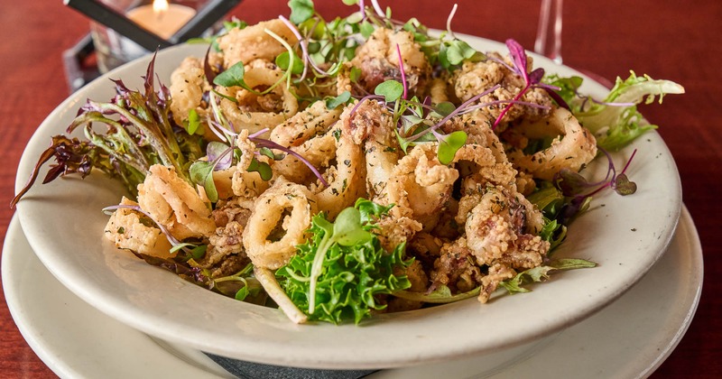 Calamari served with greens