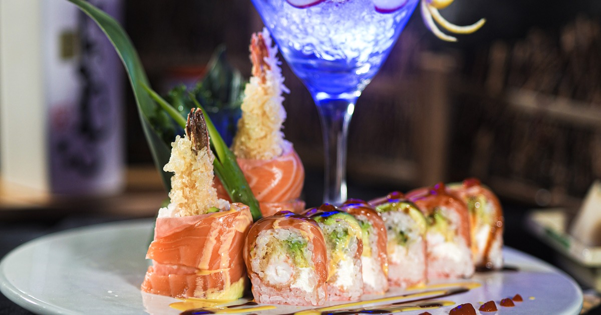 Shrimp tempura sushi rolls topped with salmon