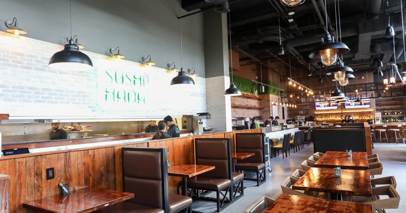 Interior, tables and chairs, bar on the left