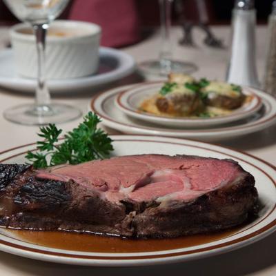 Prime rib steak served on the table