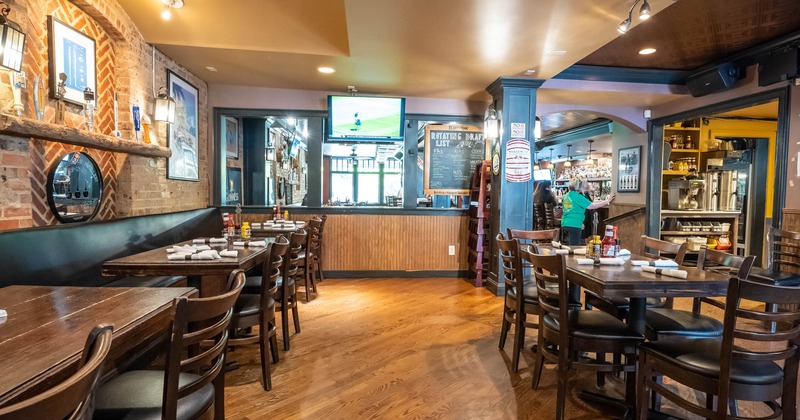 Interior, dining area, bar in the back