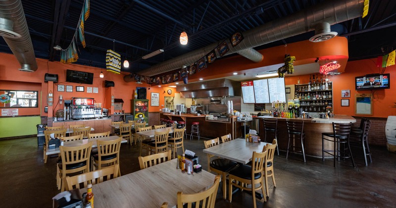 Dining area with tables for four