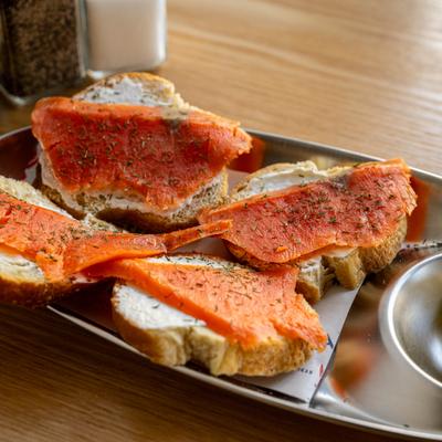Salmon Crostinis served on toasted bread with cream cheese.